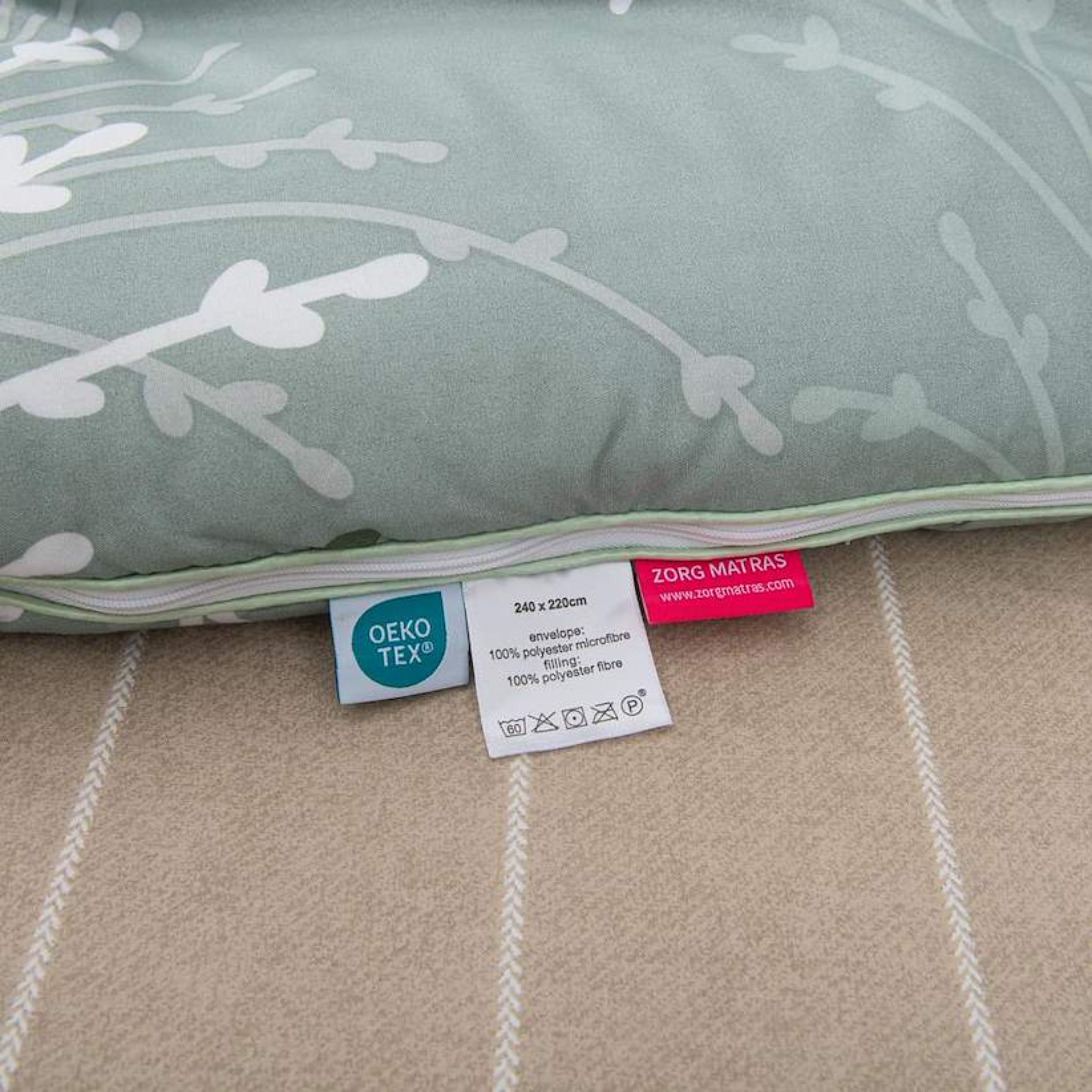 Detailfoto van het Zorgmatras-label aan het Elva dekbed.